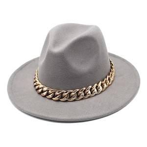 Detail of grey wool fedora hat featuring a stylish thick gold chain trim accessory