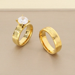 Gold-plated stainless steel wedding ring set with 18k finish and cubic zirconia stone
