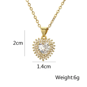Detailed view of gold heart pendant with dimensions 2cm x 1.4cm and weight 6g