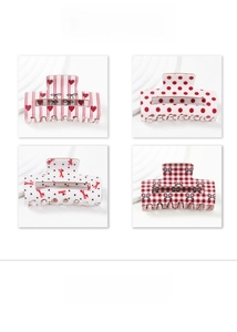 Detailed grid view of four red and white checkered, polka dot, and striped hair claws
