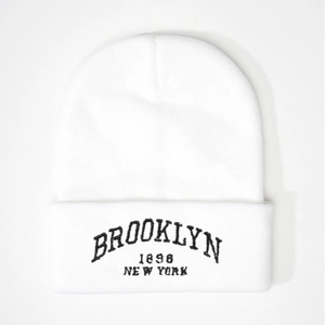 White knitted beanie with Brooklyn 1898 New York embroidery in retro style