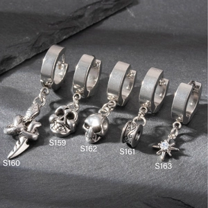 Mens stainless steel skull and dagger earrings set on a dark textured background