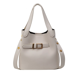 Off-white lychee pattern nylon bucket bag with gold buckles and minimalist commuter style