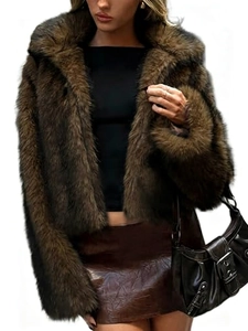 Close-up of the fluffy texture and collar detail of the tan faux fur winter jacket