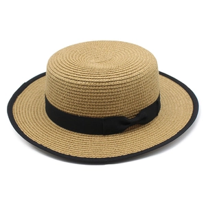 Flat top straw boater hat with black ribbon bow and trim for summer sun protection