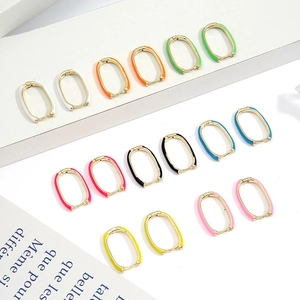 U-shaped oval hoop earrings in seven colorful enamel finishes with gold-tone metal frames
