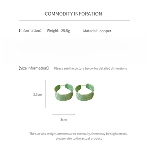 Detailed spec sheet showing 3.3cm green enamel hoop earrings in copper, weighing 25.5g