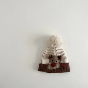 Detail of baby knitted hat with 3D elk nose, pom-pom, and Sunny embroidery