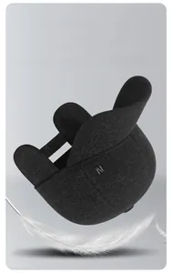 Macro detail of the thermal earflap baseball cap with N logo and lightweight feather