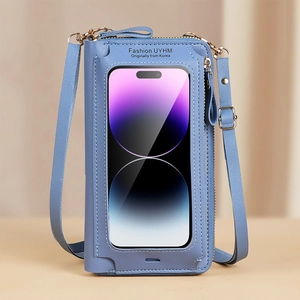 Détail du sac de téléphone bleu en similicuir avec fenêtre tactile transparente
