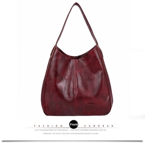 Front view of a dark red tote bag with diamond quilted patterns and polished PU leather