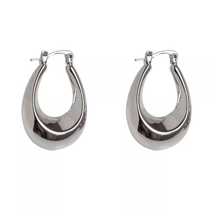 Polished silver teardrop earrings with a sleek minimalist chunky metal mirror finish
