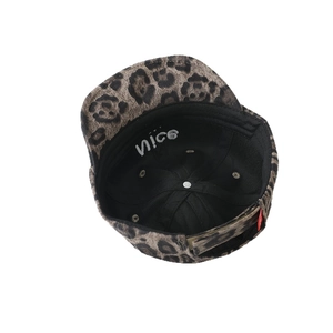 Baby leopard print baseball cap with adjustable strap and red tag detail on back