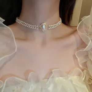 Collier Ras Du Cou Künstliche Perle Double Couche Avec Pendentif Künstliche Perle Ovale Halo De Strass Bijoux Élégants Français Vintage Pour Femmes