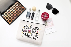 Close-up of waterproof cotton linen makeup bag with stylish letter print and zipper detail