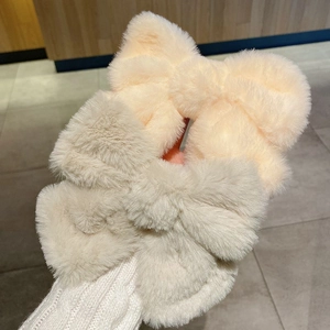 Large plush bow hair clips in beige and light gray for autumn and winter styling