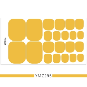 Flat lay of YMZ295 solid yellow toenail stickers in various sizes on a white background