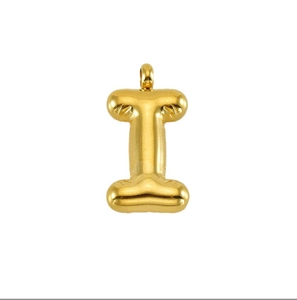 Detailed view of a golden 3D bubble letter I pendant with a polished metallic finish
