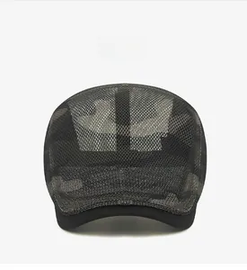 Close-up of dark grey camouflage mesh fabric on a breathable sun protection cap