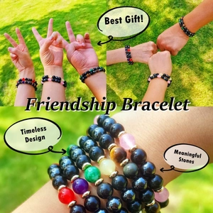 Outdoor shot showing multiple natural tiger eye and agate beaded friendship bracelets