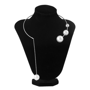 Detail of silver stainless steel choker necklace with elegant white pearl fringe tassels