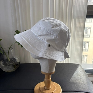 White breathable wide brim sun hat for women with heart metal logo and foldable design