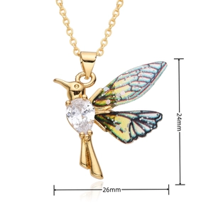 Detailed view of hummingbird pendant with colorful wings and pear-shaped zircon stone