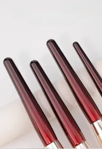 Detail of 15-piece professional makeup brush set with durable solid wood handles