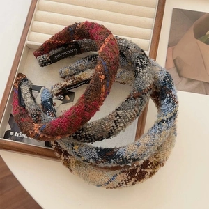 Set of four handmade plaid tweed headbands in assorted colors like red and blue grey