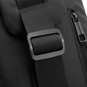 Close-up of waterproof zipper and nylon webbing on a tactical crossbody chest bag