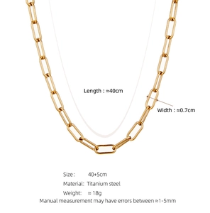 Detail view of gold titanium steel paperclip chain necklace with 40+5cm size specs