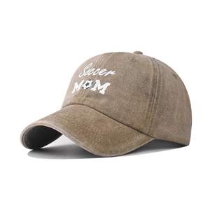 Detail of washed cotton baseball cap with Soccer MOM embroidery and vintage texture