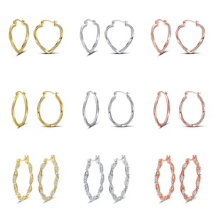 Detailed grid of geometric 925 sterling silver earrings in gold silver and rose gold