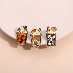 Set of 3 Halloween enamel pins featuring pumpkin latte, witch hat, and ghost drinks