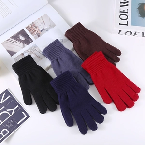 Close-up of winter knit gloves in five colors with ribbed cuffs for windproof warmth