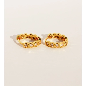 Chic gold hexagonal honeycomb earrings with pavé zircons on a clean white background