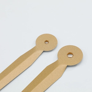 Matte gold metal clock hands for DIY repair featuring a sleek central ridge design