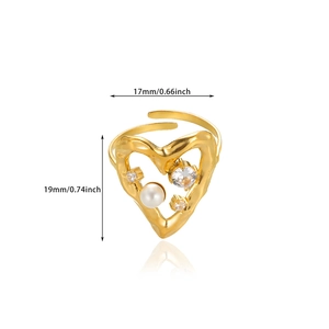 Detailed view of pearl and zircon heart ring with size markings 17mm width and 19mm height