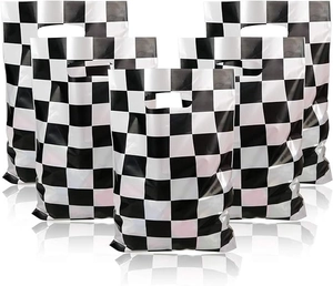 Detail view of six black and white checkered plastic gift bags with die-cut handles