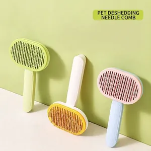 Cepillo de aseo autolimpiable para perros y gatos en cuatro colores suaves