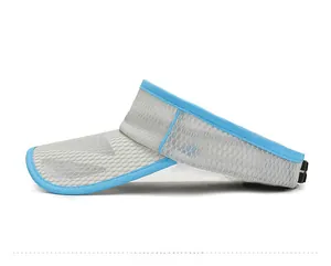 Detail of children's grey mesh sun visor with blue trim and breathable honeycomb fabric