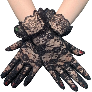Elegant black lace gloves with floral mesh detailing shown on a person's crossed hands