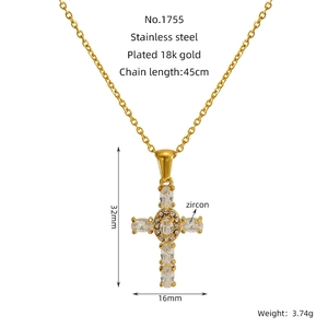 Detail of 18K gold-plated stainless steel cross necklace with white zircon stones
