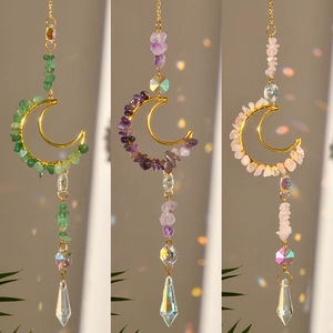 Detailed trio of moon-shaped crystal suncatchers with metal wire wrap and faceted drops