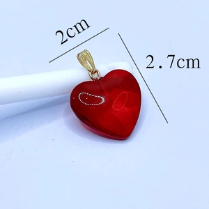 Colorful heart-shaped glass pendant in red with gold clasp, size 2cm by 2.7cm