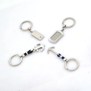 Square stainless steel anchor keychains with decorative blue and black braided ropes