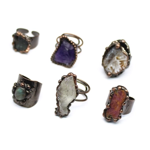 Detailed set of six vintage raw stone rings with amethyst and agate on antique copper bands