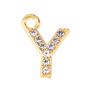Macro shot of a golden alloy letter Y pendant featuring sparkling clear rhinestones