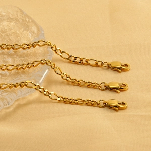 Polished gold-plated stainless steel Figaro chain necklace with lobster clasp