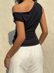 Haut moulant sexy à une épaule avec strass et pantalon blanc pour la mode d'été